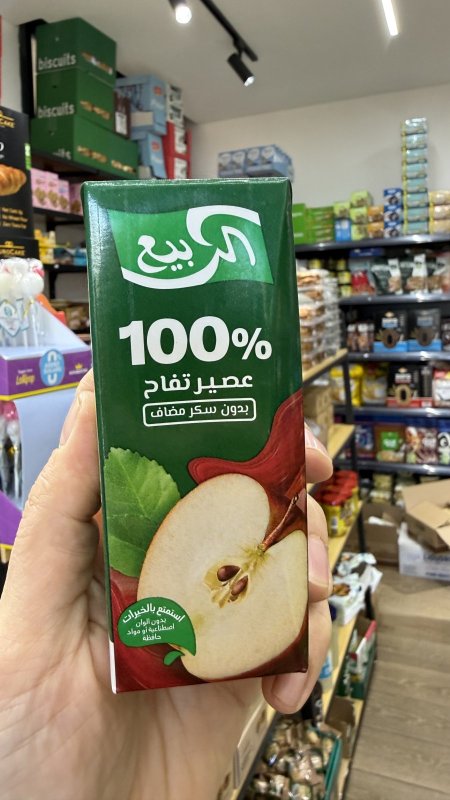 علبة الربيع عصير تفاح بدون سكر مضاف وزن العلبة 180غرام