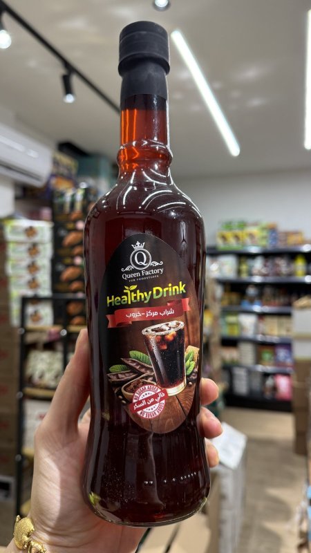 شراب مركز بطعم  الخروب خالي من السكر وخالي من السعرات الحرارية وزنها 1 لتر