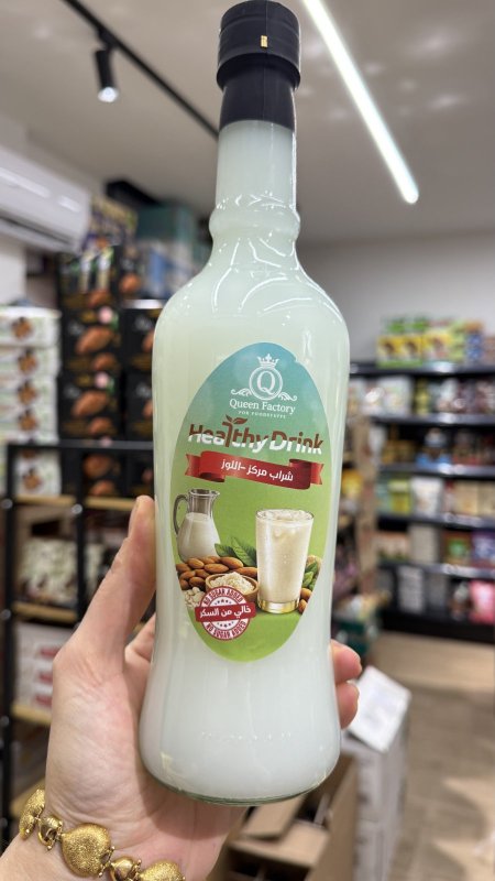 شراب مركز بطعم اللوز خالي من السكر وخالي من السعرات الحرارية وزنها 1 لتر