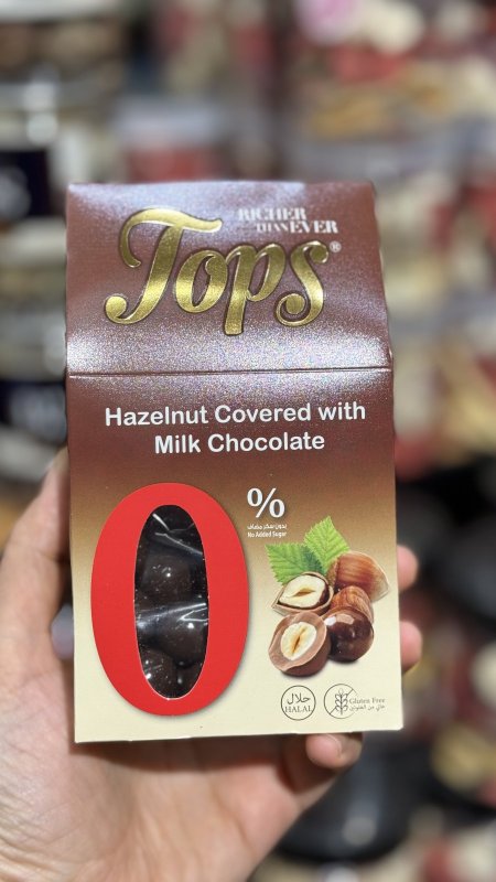 Tops دراجيه كرات الشوكولاتة الحليب بالبندق بدون سكر وزنها 150غرام