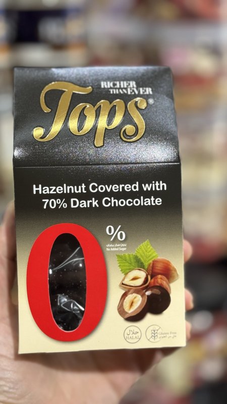 Tops دراجيه كرات الشوكولاتة الداكنة بالبندق بدون سكر وزنها 150غرام