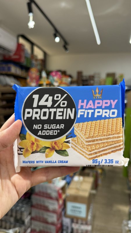 ويفر Happy Fit Pro محشي بكريمة الفانيلا عالي البروتين وخالي من السكر وزنه 95 غرام