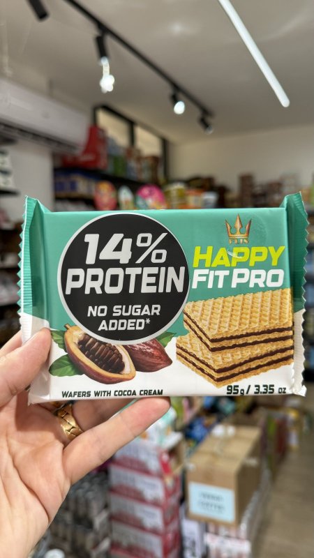 ويفر Happy Fit Pro محشي بكريمة الكاكاو شوكولاته عالي البروتين وخالي من السكر وزنه 95 غرام