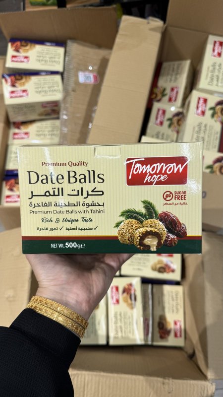 كرات التمر محشي طحينية ومغطى بالسمسم خالية من السكر وزنها 500 غرام