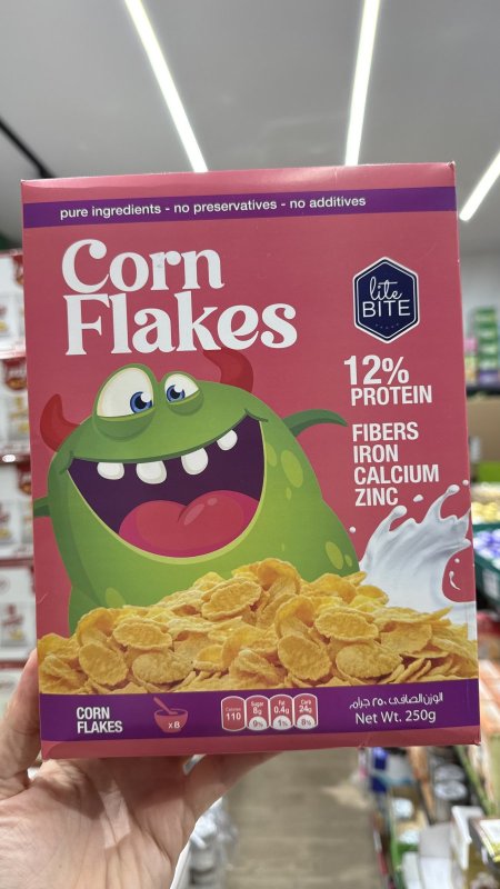 كورنفلكس رقائق الذرة عالي البروتين والحديد والكالسيوم والزنك والالياف بدون سكر مضاف وزنه 250 غرام