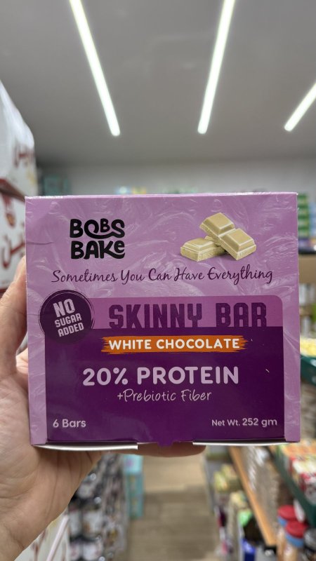 بوكس بارات شوكولاته بيضاء عالية البروتين والبروبيوتيك خالي من السكر فيه 6 بارات