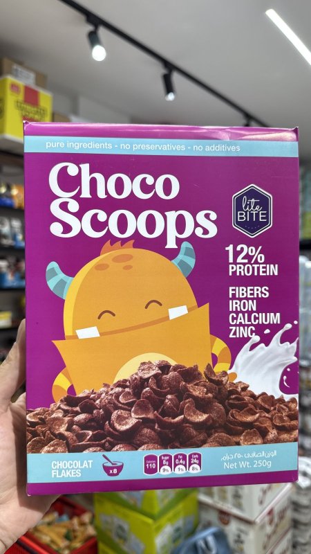 كورنفلكس رقائق شوكولاته choco scoops عالي البروتين والحديد والكالسيوم والزنك والالياف بدون سكر مضاف وزنه 250 غرام